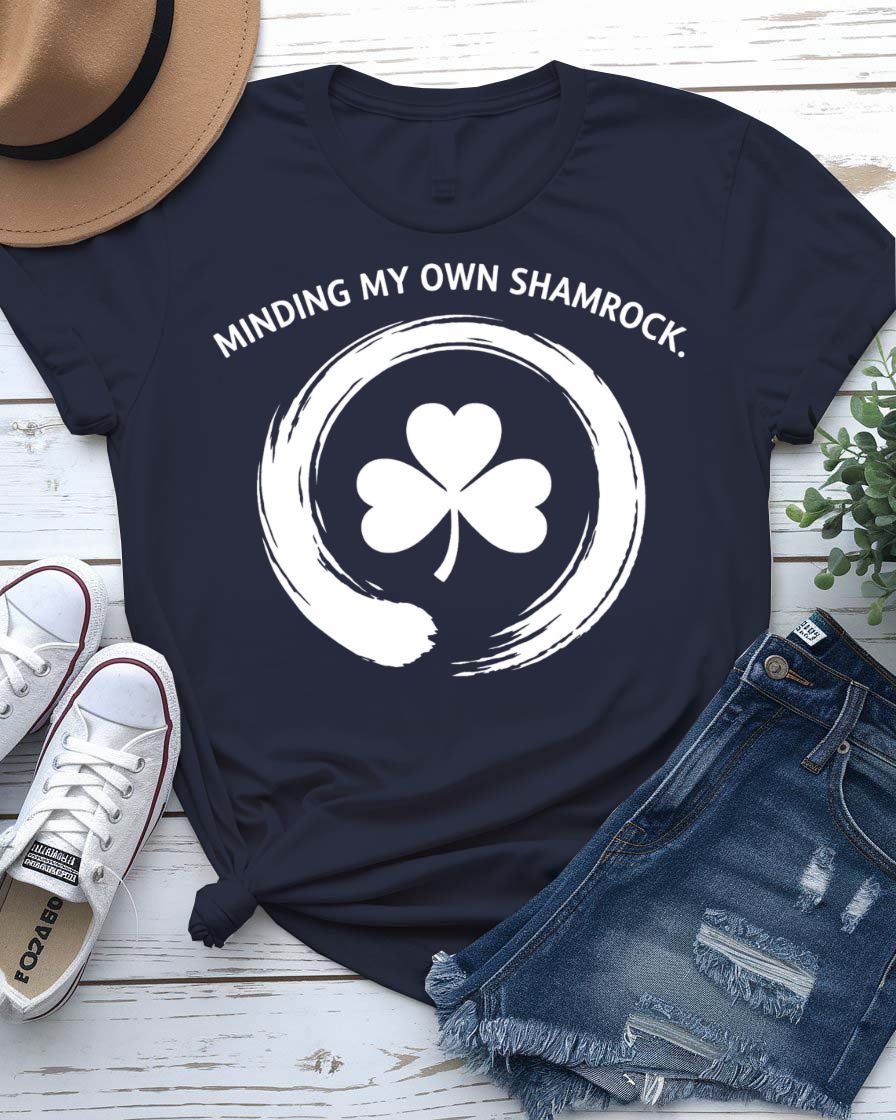 Minding My Own Shamrock St. Patrick's Day Tee with peaceful shamrock on model
