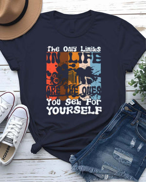 The Only Limits Streetwear Tee with figure exploding through brick wall on model