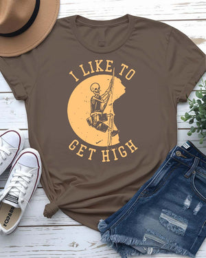 I Like to Get High Urban Style Tee with figure soaring above skyline on model