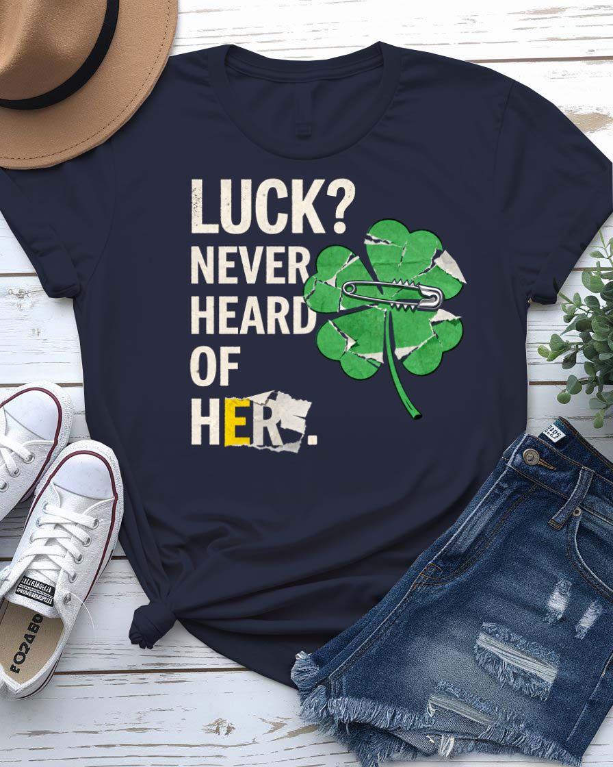 Luck Never Heard of Her St. Patrick's Tee with confident woman walking past clovers on model