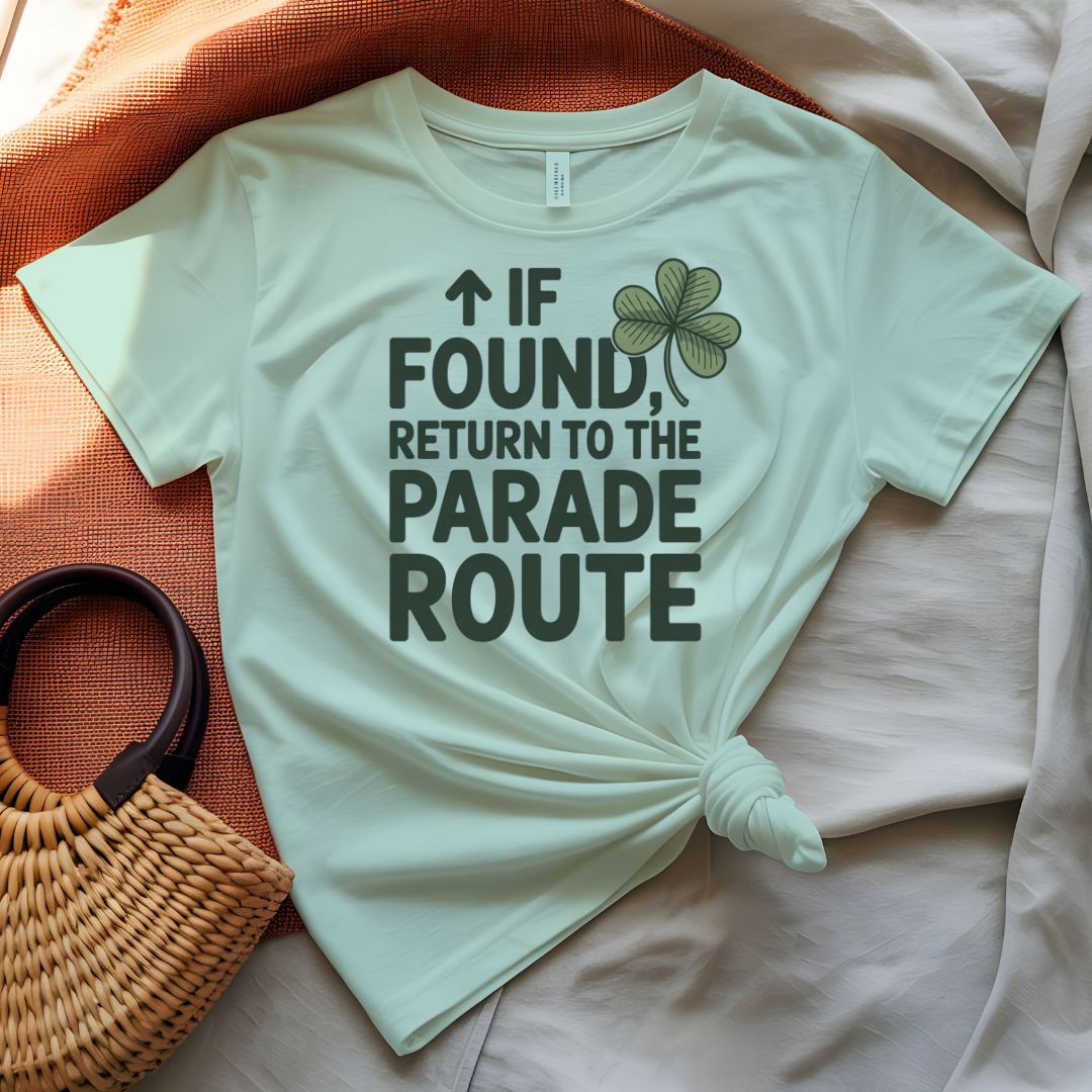 If Found Return to Parade St. Patrick's Day Tee with vintage luggage tag on model