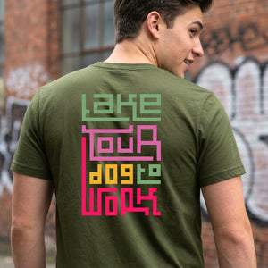Take Your Dog To Work typographic tee with paw prints on design on model