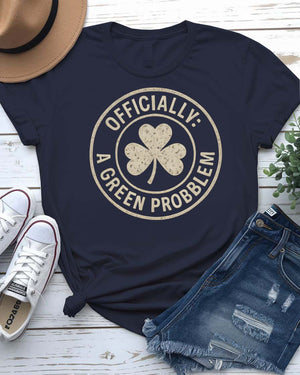 Officially A Green Problem St. Patrick's Tee with warning label design on model
