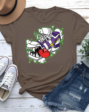 Shoes Bite Streetwear Tee with sneaker being bitten by concrete teeth on model