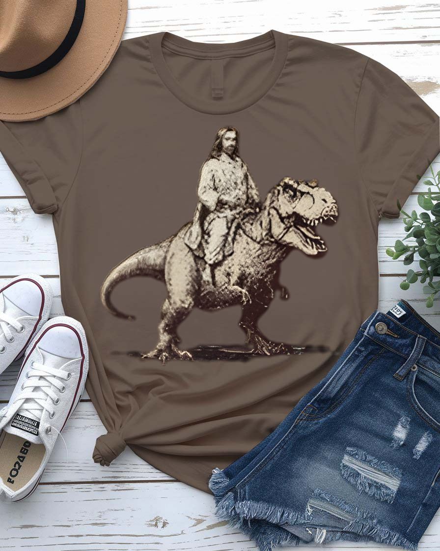 Jesus at T-Rex t-shirt featuring a classical painting of Jesus with a Tyrannosaurus
