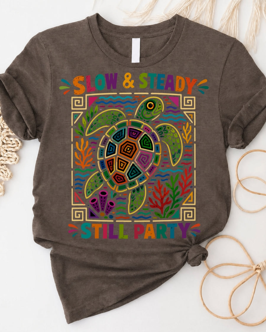 Slow and steady t-shirt with determined turtle crossing finish line design
