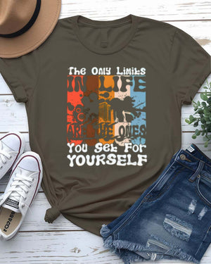 The Only Limits Streetwear Tee with figure exploding through brick wall on model