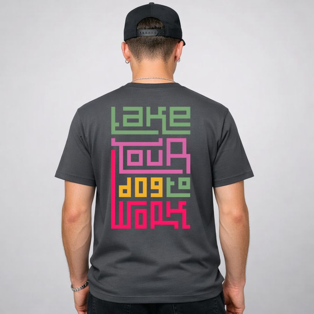 Take Your Dog To Work typographic tee with paw prints on design on model