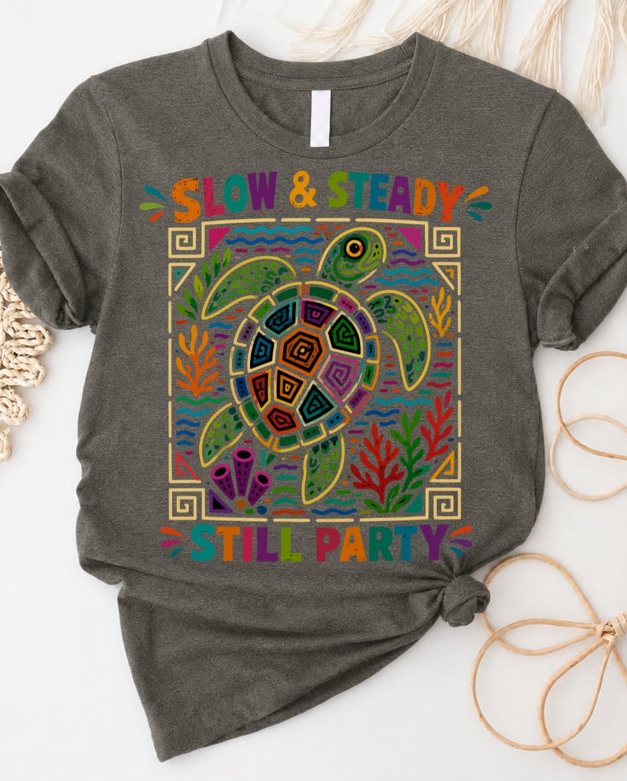 Slow and steady t-shirt with determined turtle crossing finish line design