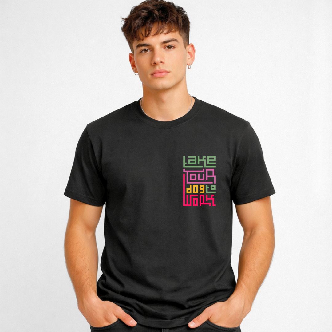 Take Your Dog To Work typographic tee with paw prints on design on model