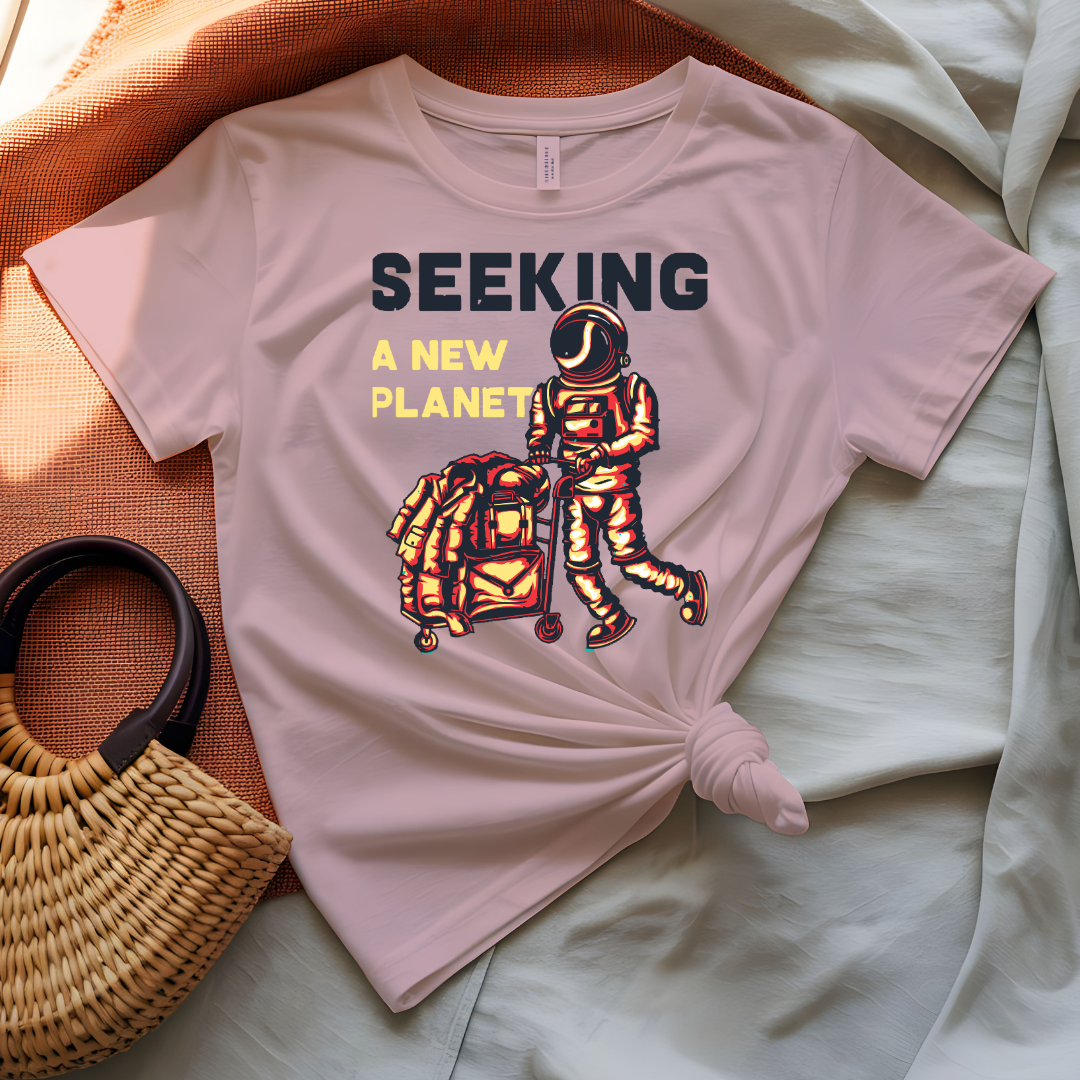 Seeking a New Planet astronaut drifting toward distant world graphic tee on model
