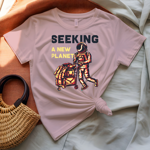 Seeking a New Planet astronaut drifting toward distant world graphic tee on model