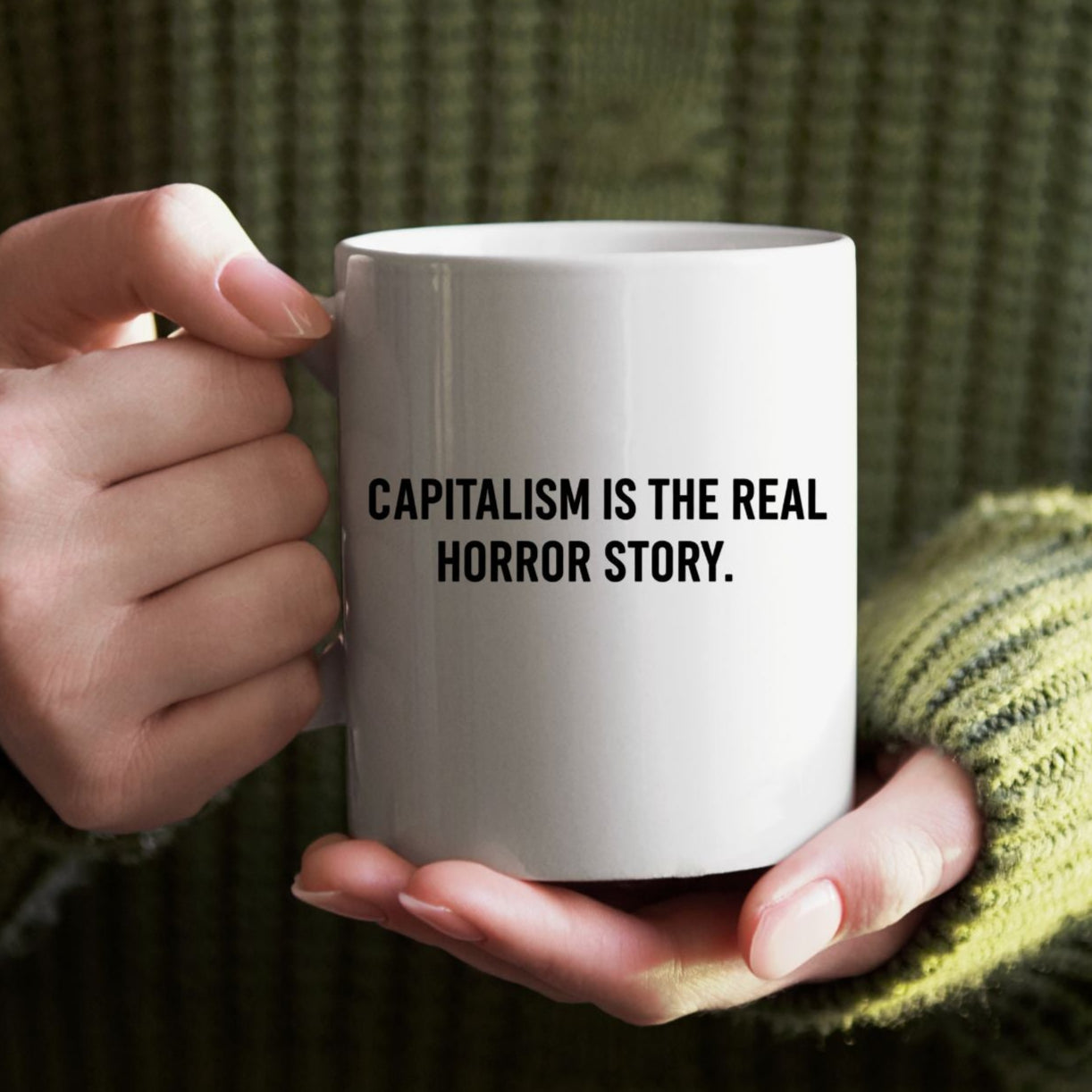 Capitalism Is Real Horror Story mug on office desk