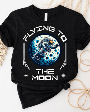 Flying to the moon astro tee with astronaut moon swing graphic