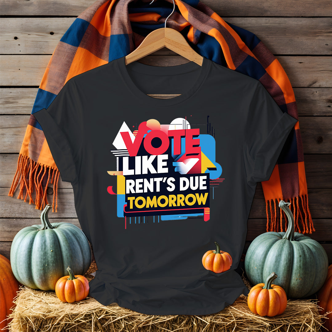 Front-facing Vote Like Rent’s Due Tomorrow tee on flat lay background
