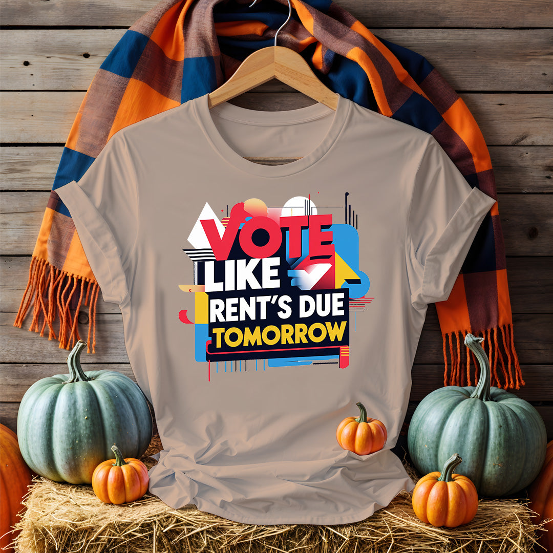 Front-facing Vote Like Rent’s Due Tomorrow tee on flat lay background