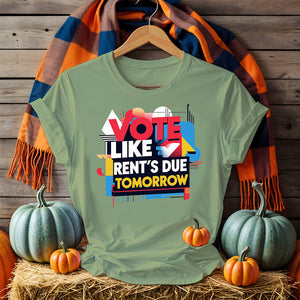 Front-facing Vote Like Rent’s Due Tomorrow tee on flat lay background