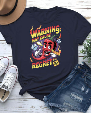 Funny t-shirt with “Warning May Cause Regret” meme quote printed in bold lettering, styled for food lovers and humor fans.