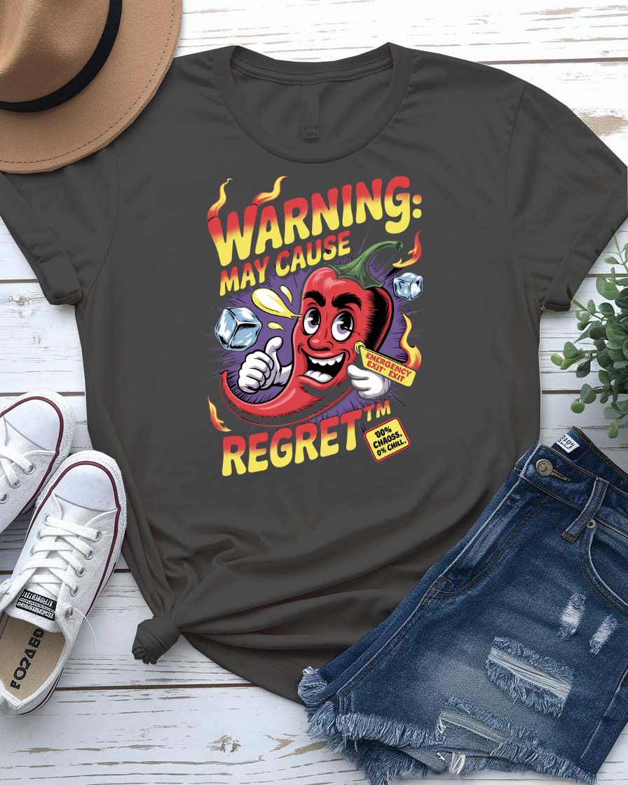 Funny t-shirt with “Warning May Cause Regret” meme quote printed in bold lettering, styled for food lovers and humor fans.