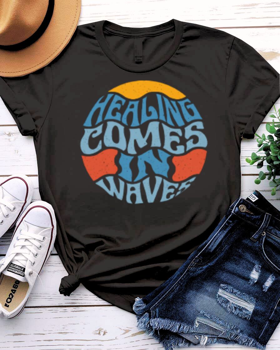 Healing Comes in Waves Tee with gentle ocean waves on model