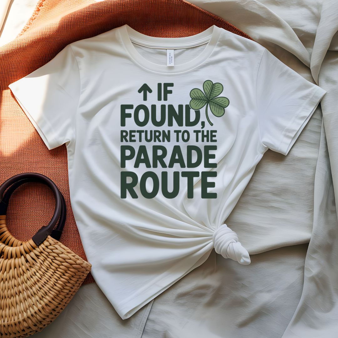 If Found Return to Parade St. Patrick's Day Tee with vintage luggage tag on model