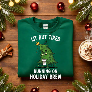 “Lit But Tired Christmas Sweatshirt – funny holiday meme sweatshirt for exhausted coffee lovers, cozy unisex fleece pullover from Memez.Store.