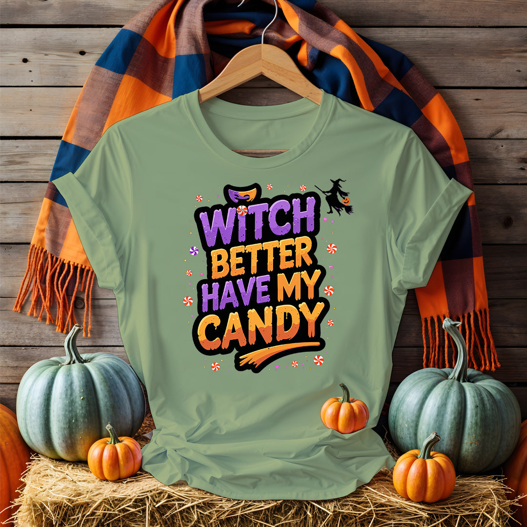 Model wearing Funny Witch Better Have My Candy Tee with pumpkin decor