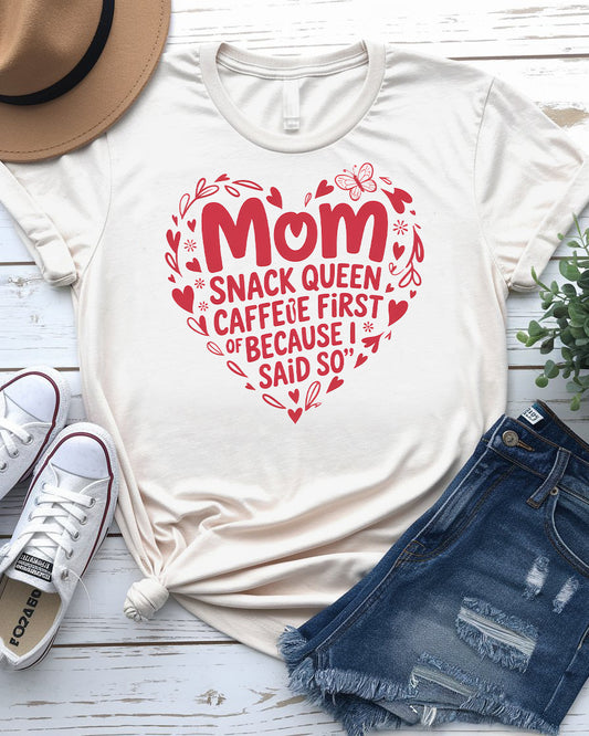 Mom Snack Queen Funny Meme Tee front view in pink color
