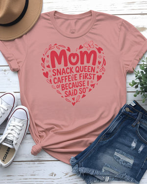 Mom Snack Queen Funny Meme Tee front view in pink color