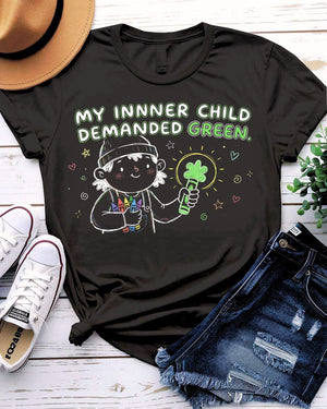 My Inner Child Demanded Green St. Patrick's Day Tee with jumping kid silhouette on model