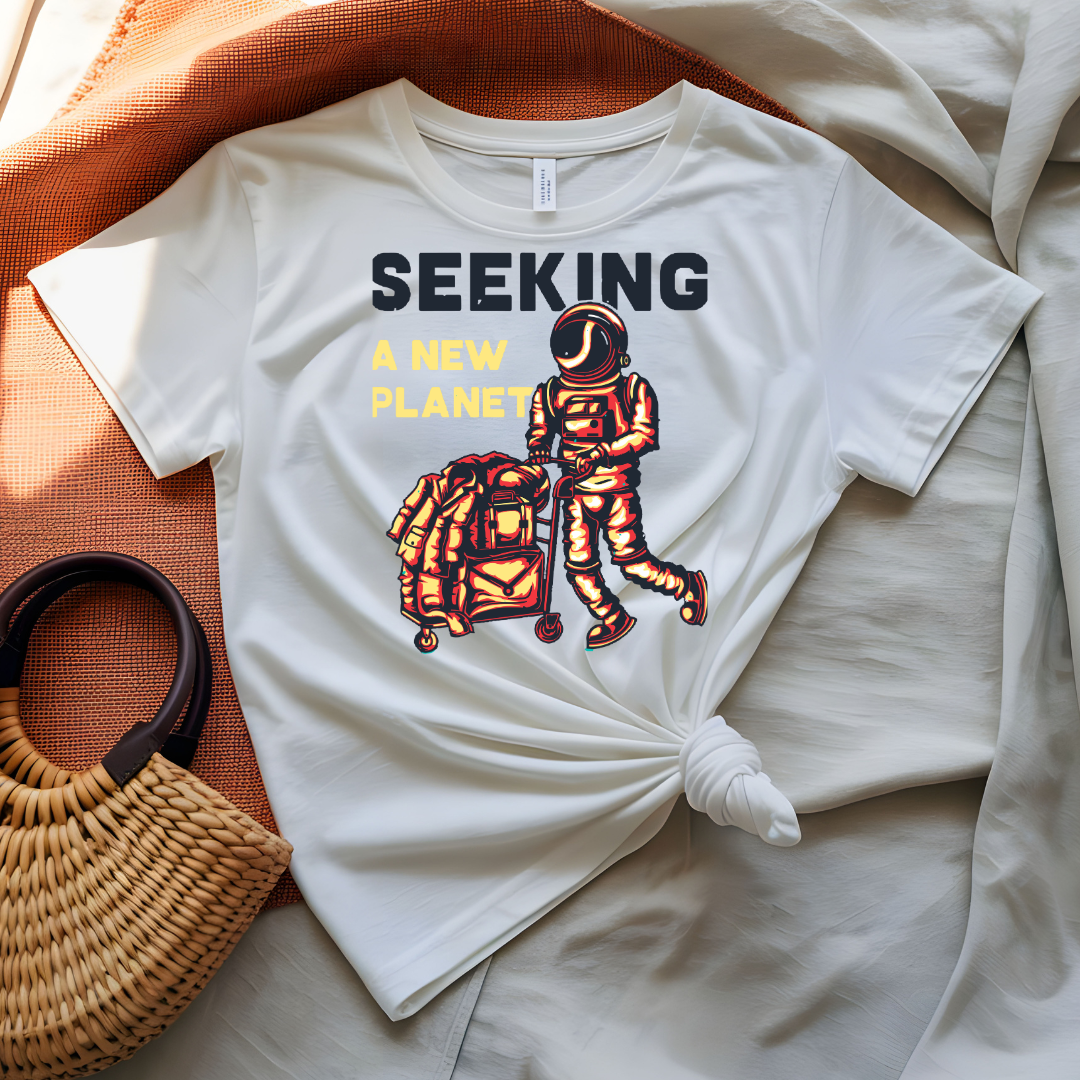 Seeking a New Planet astronaut drifting toward distant world graphic tee on model