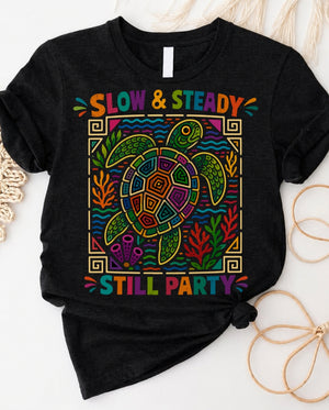 Slow and steady t-shirt with determined turtle crossing finish line design