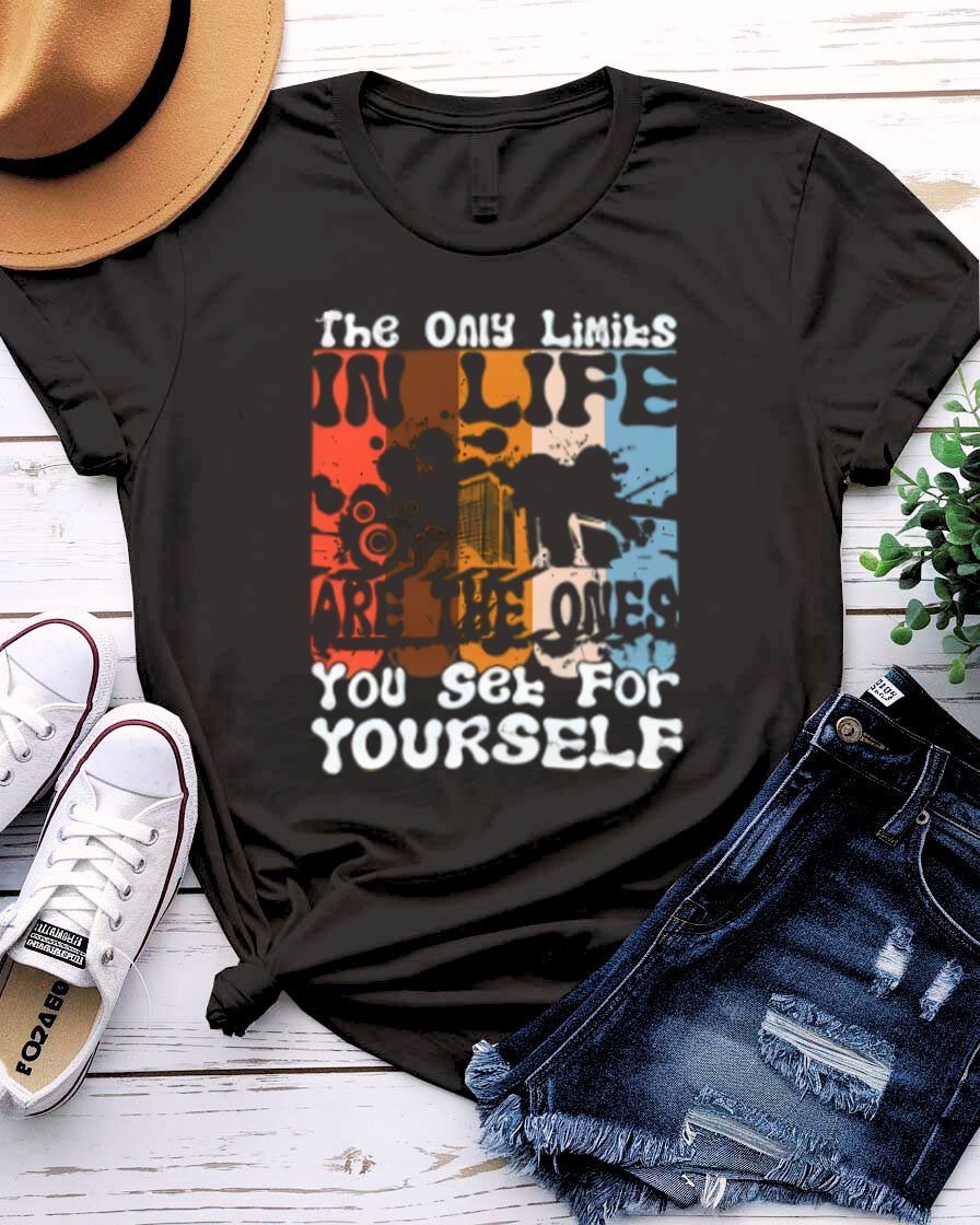 The Only Limits Streetwear Tee with figure exploding through brick wall on model