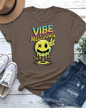 Unisex meme t-shirt with the phrase “Vibes Meltdown” in playful summer font, modeled in sunny outdoor setting.