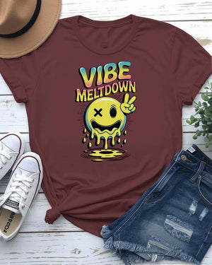 Unisex meme t-shirt with the phrase “Vibes Meltdown” in playful summer font, modeled in sunny outdoor setting.