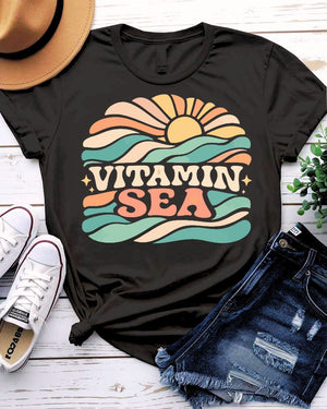 Vitamin sea design tee pill bottle labeled sea with wave