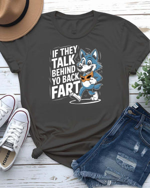 White unisex t-shirt with bold black text “If They Talk Behind You” – a sharp, witty meme quote tee with attitude.